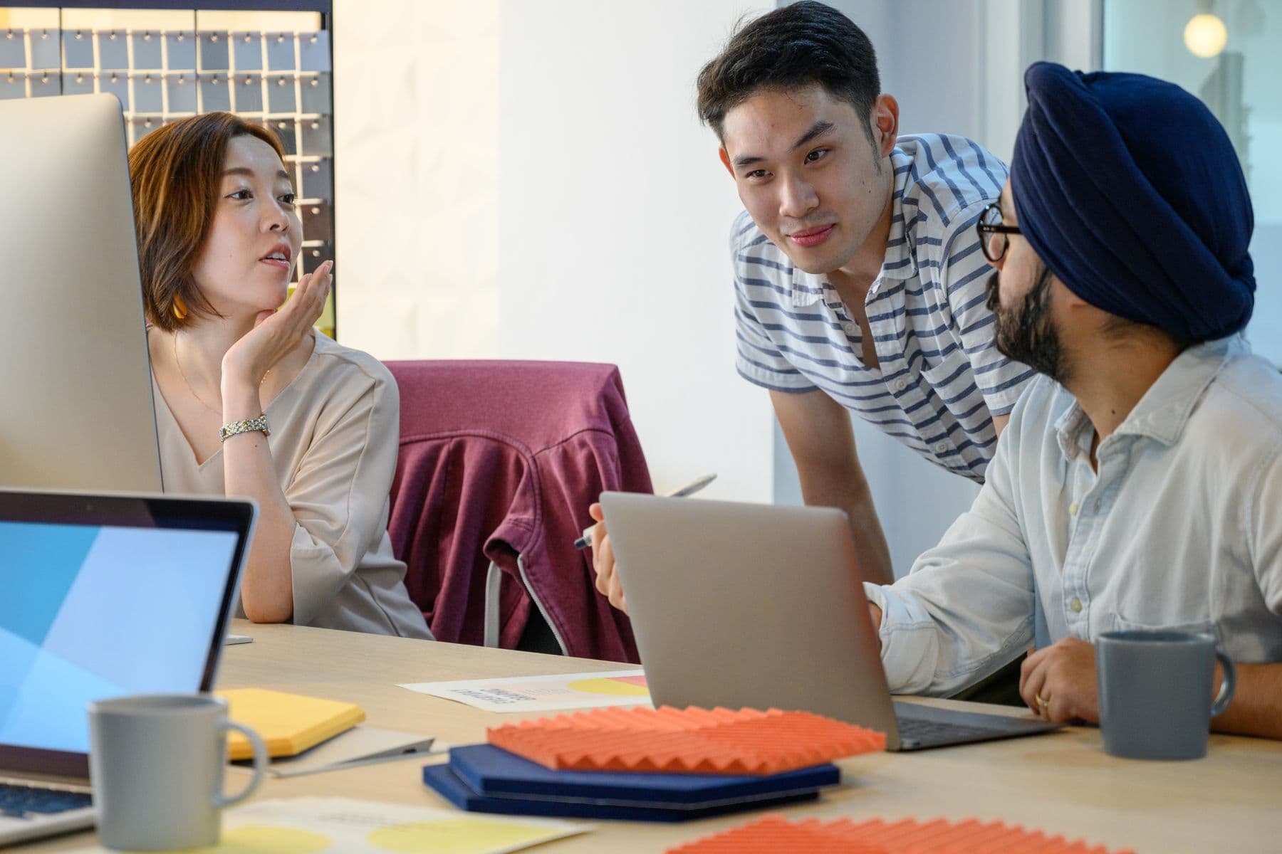 A team using product data to make a decision together