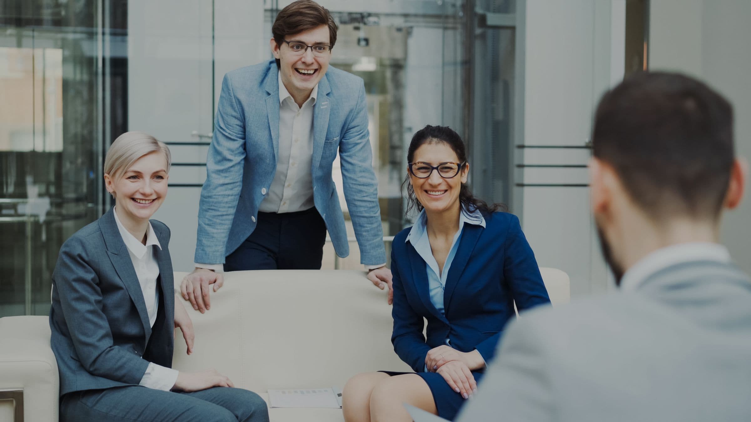 Agency and client team reviewing results together in a modern office